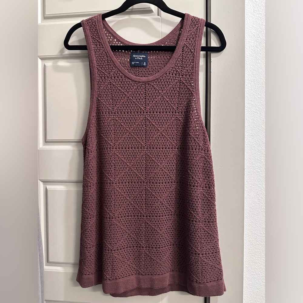Knitted tank top that is perfect for spring and summer.